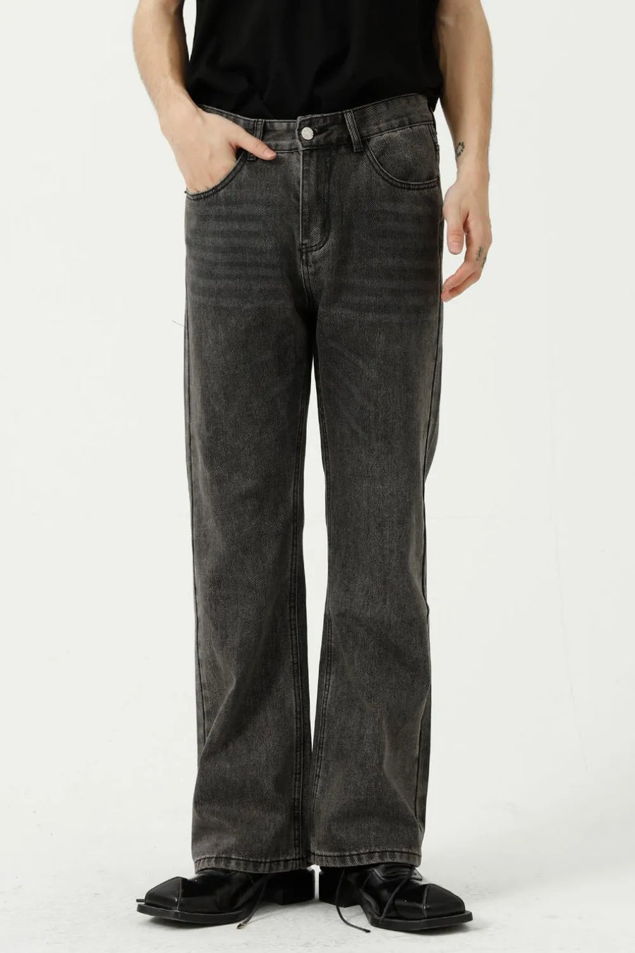 Relaxed flare denim trousers in dark gray, with a casual, breathable fit.
