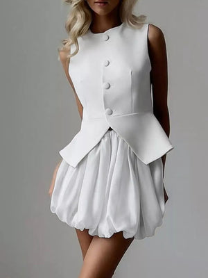 White sleeveless peplum vest dress with button front and bubble skirt