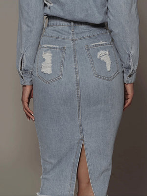 Light wash denim pencil skirt with distressed details and back pockets.