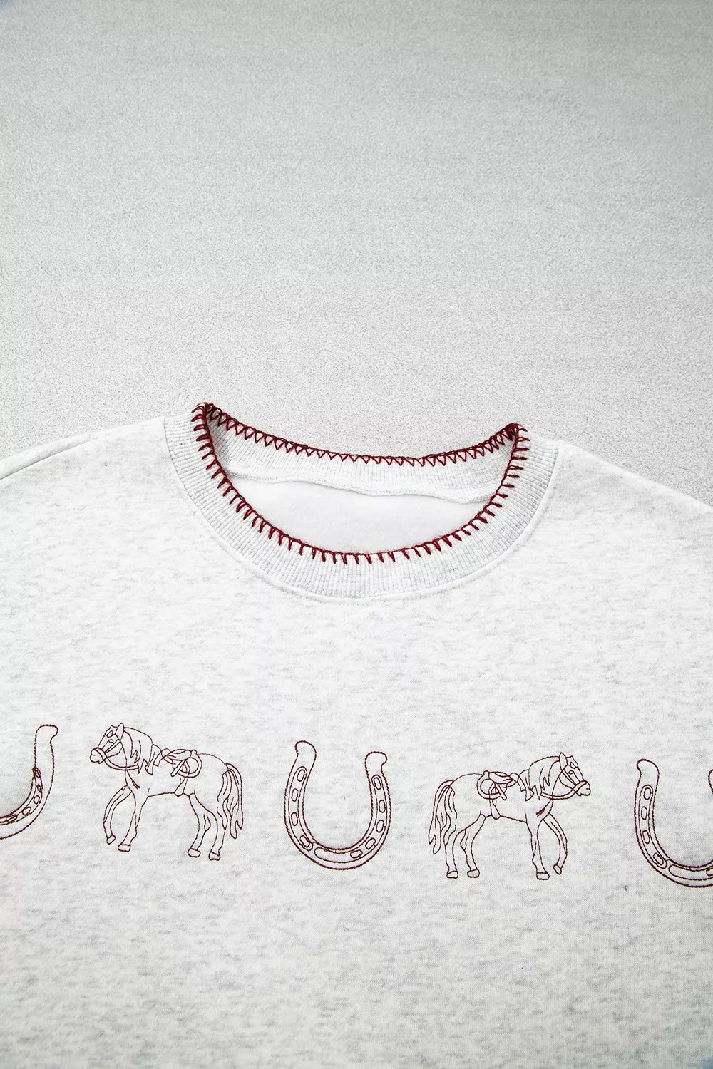 heather gray sweatshirt with ribbed hem and long sleeve