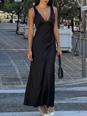 Black lace-trimmed sleeveless maxi gown with a V-neck and cinched waist.