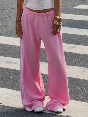 Burgundy track pants with full-length and elastic