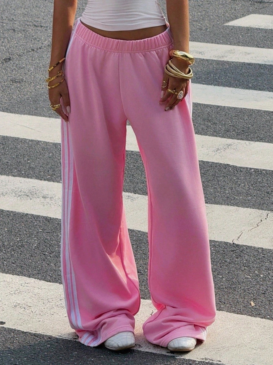Burgundy track pants with full-length and elastic