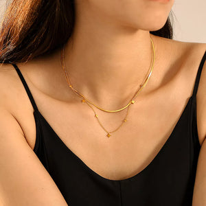 necklace in gold featuring layered and straight fit