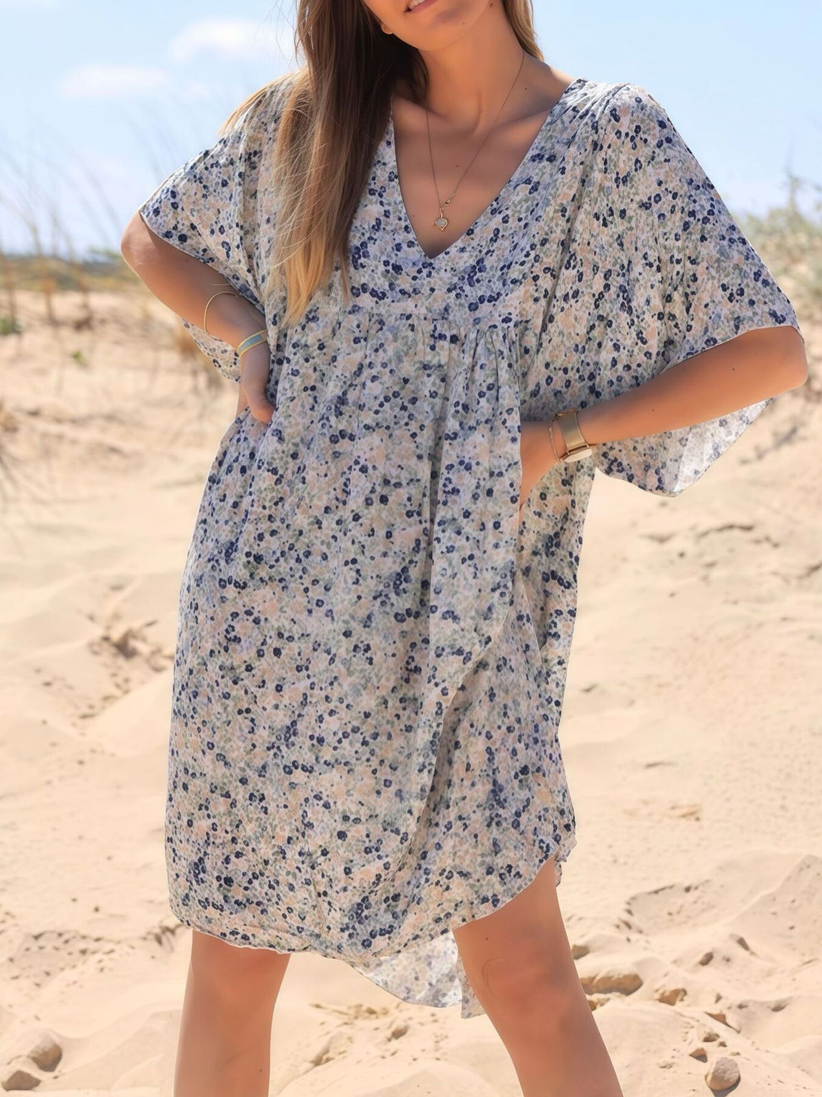 cream mini dress with ditsy floral and v-neck