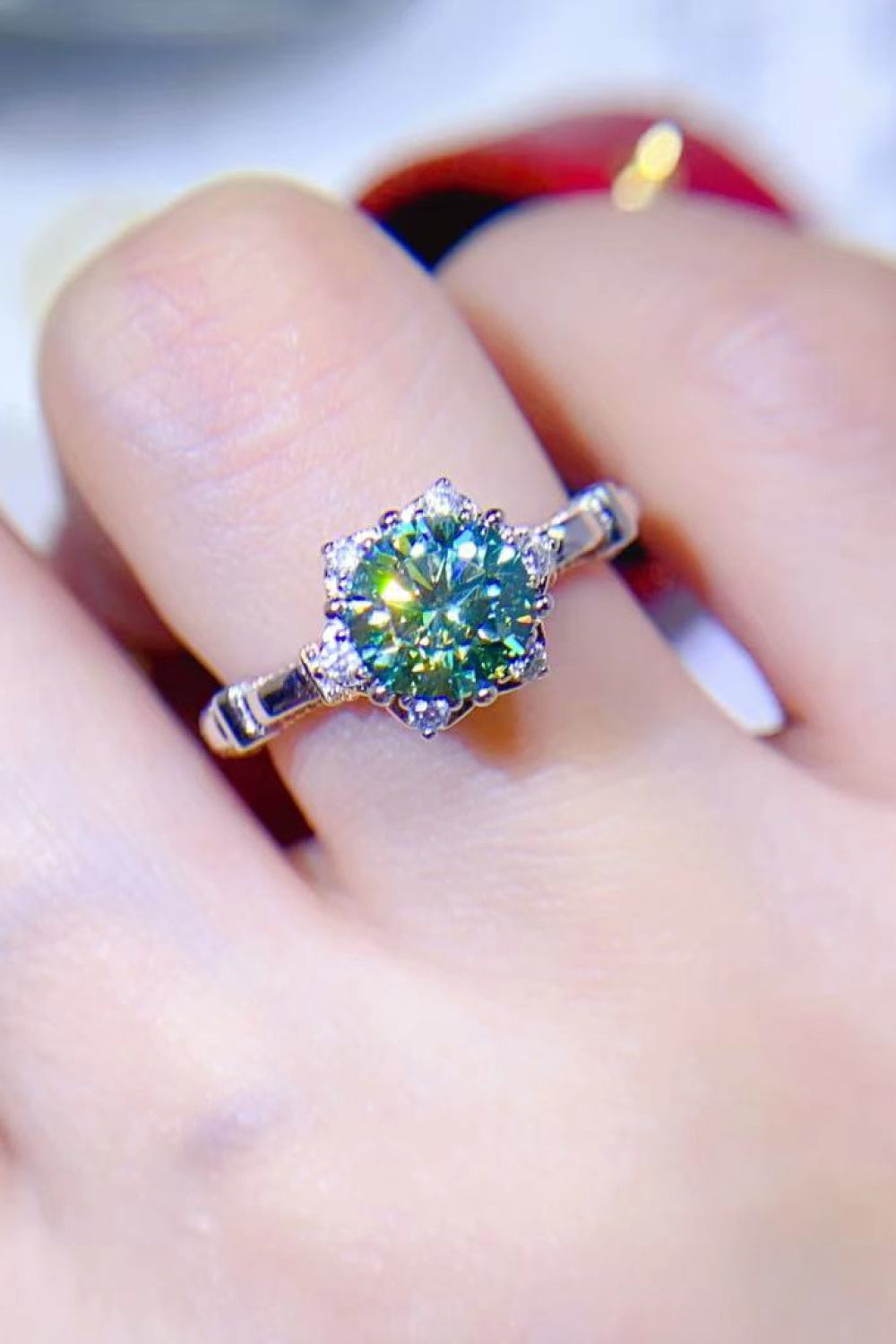 Emerald Bloom Moissanite Halo Ring in light green, 925 sterling silver with diamond accents.