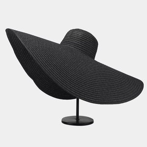 hat in black featuring wide brim and oversized fit