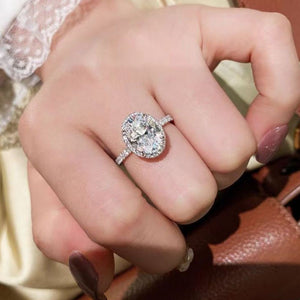 ring in silver featuring oval cut stone and classic fit