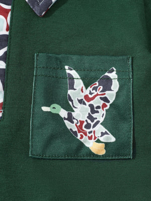 Dark green baby polo with camouflage duck pocket detail