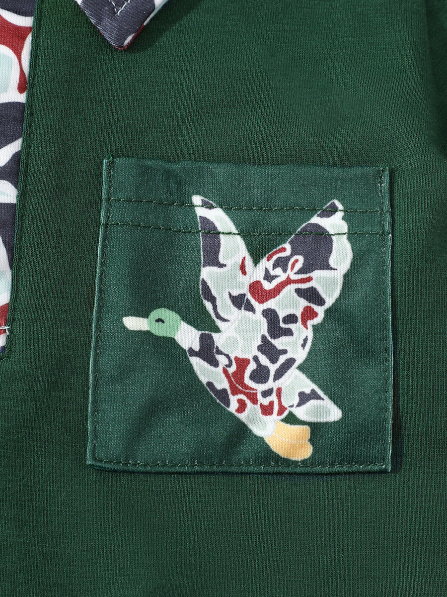 Dark green baby polo with camouflage duck pocket detail