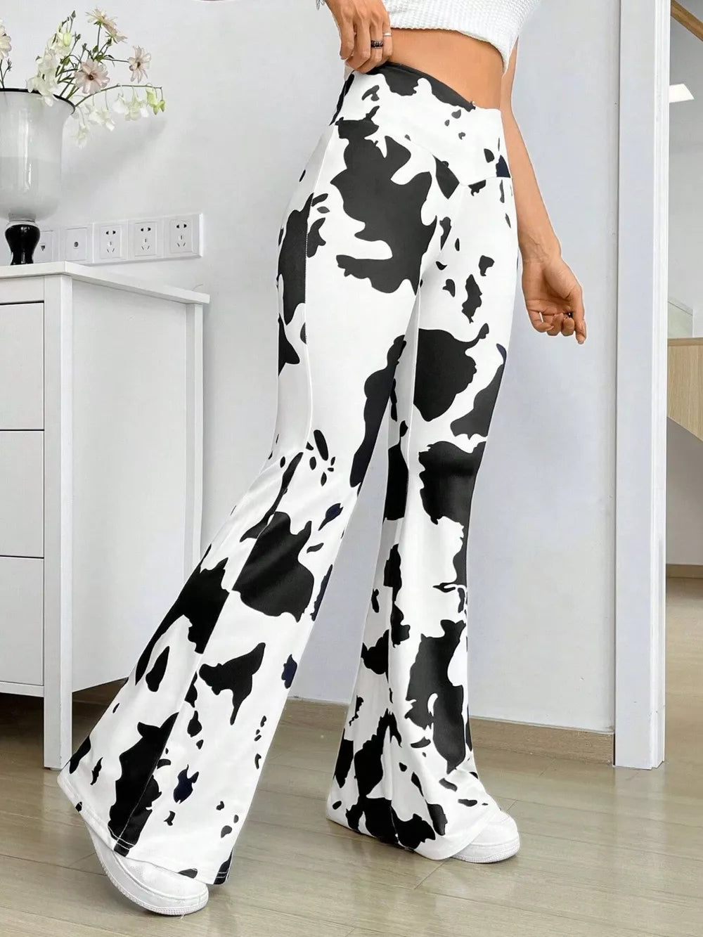 Black Cow Print Flared Pants