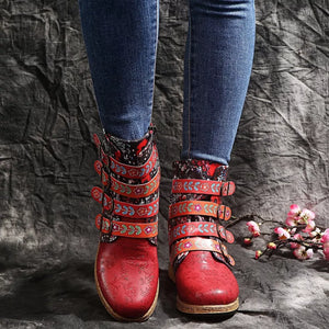 Red embroidered suede ankle boots with floral straps and buckles