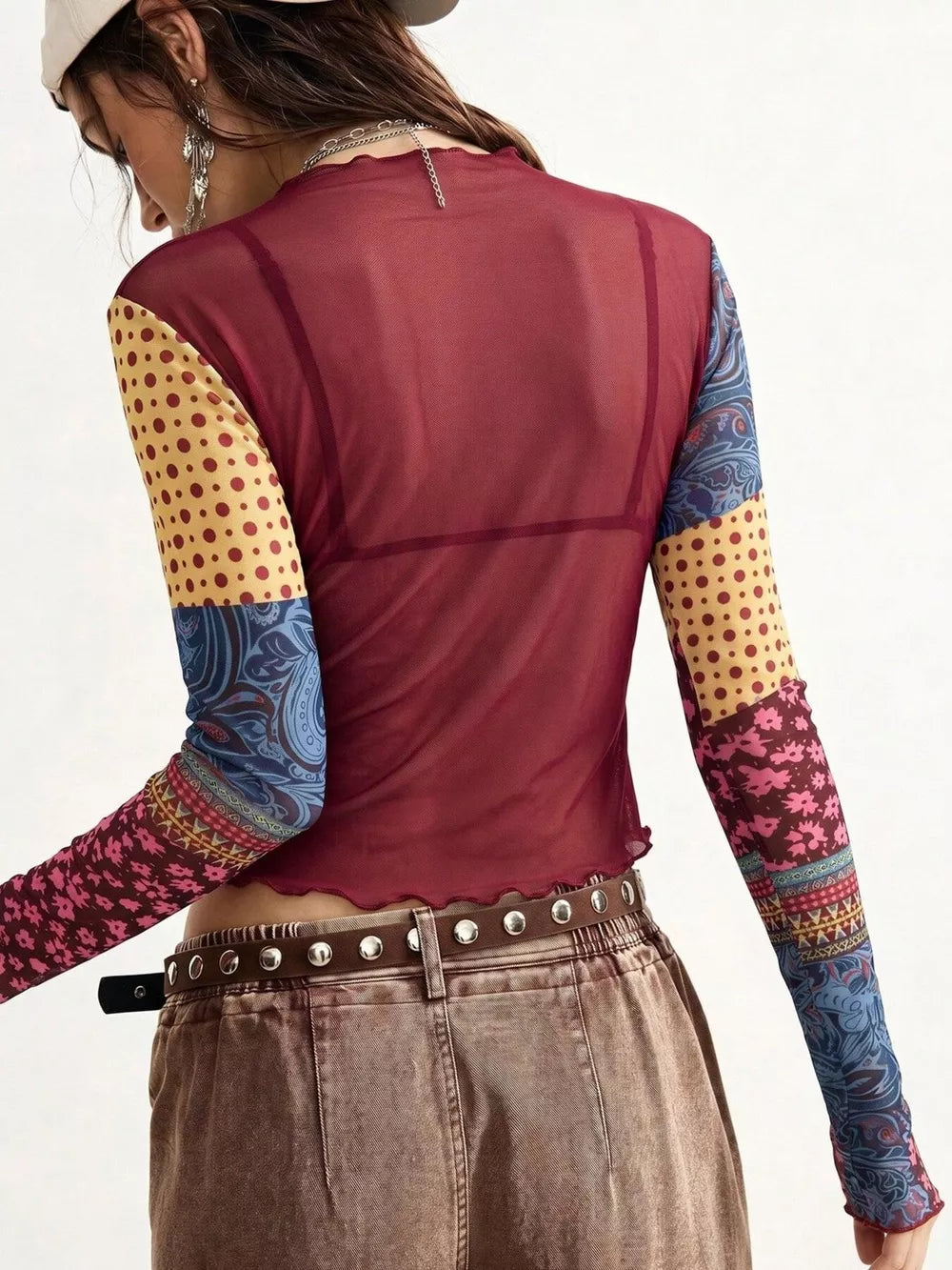 95% polyester, 5% elastane Care instructions: Machine wash cold blouse in yellow with fitted silhouette