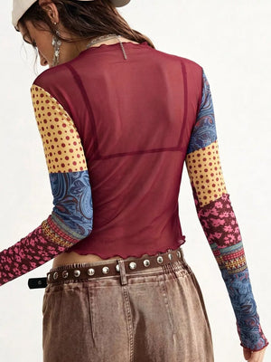 95% polyester, 5% elastane Care instructions: Machine wash cold blouse in yellow with fitted silhouette
