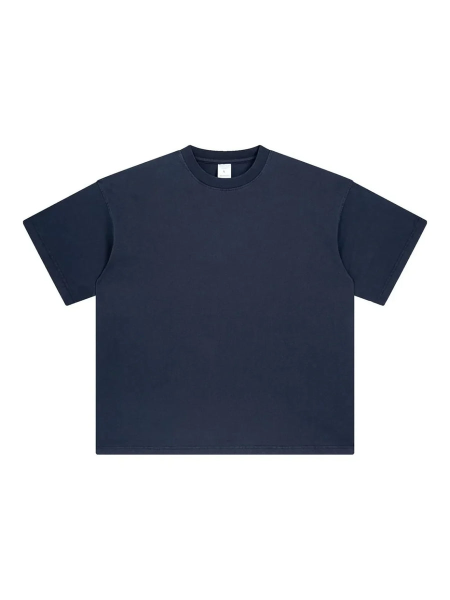 Oversized washed cotton tee in Dusty Blue with relaxed fit and crew neck.