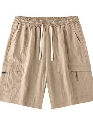 Men's khaki relaxed fit cargo shorts with drawstring waist and multiple pockets.