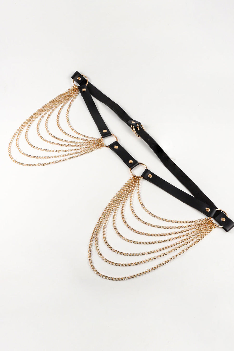 Cascading chain waist harness in black with gold chains and hardware.