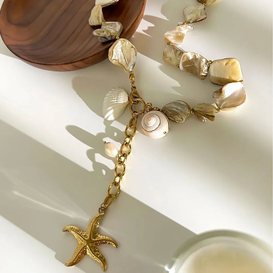 18K Gold-Plated, Stainless Steel, Shell Care instructions: Avoid wearing during necklace in Gold with straight silhouette