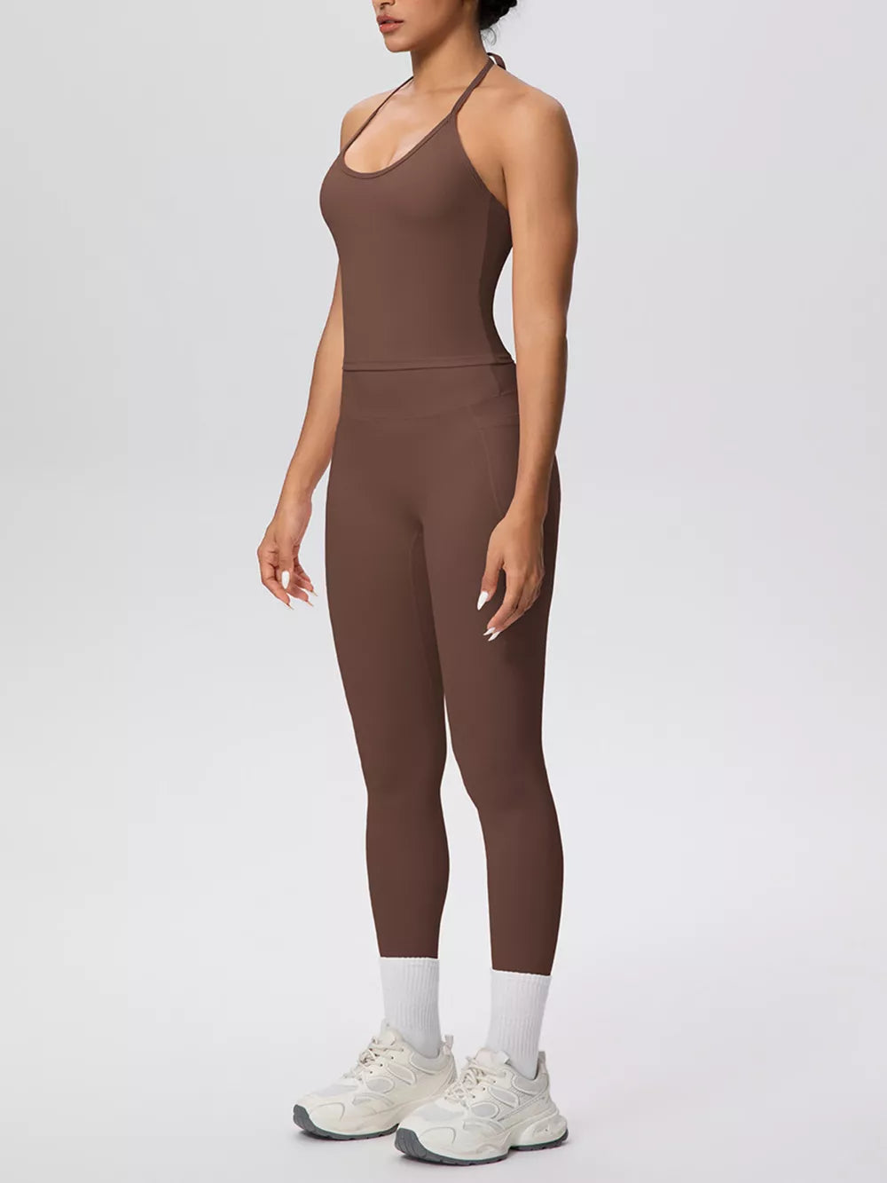 80% nylon, 20% spandex Care instructions: Machine wash cold activewear in ivory with fitted silhouette