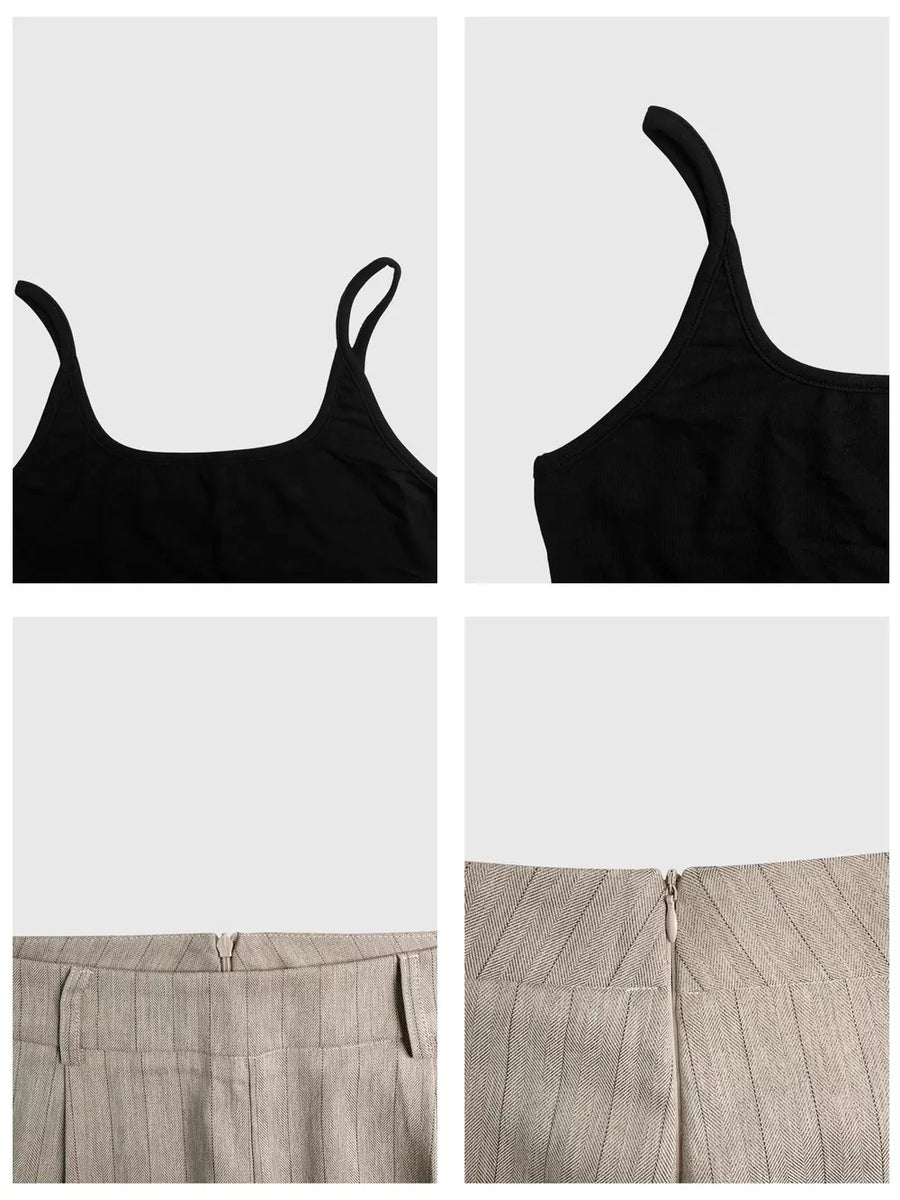 Chic sleeveless black top and pinstripe wide-leg pants set with zipper detail.