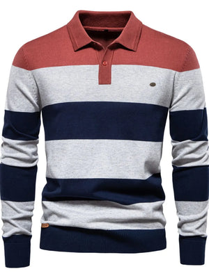Colorblock knit polo with ribbed collar in coral, gray, and navy stripes.