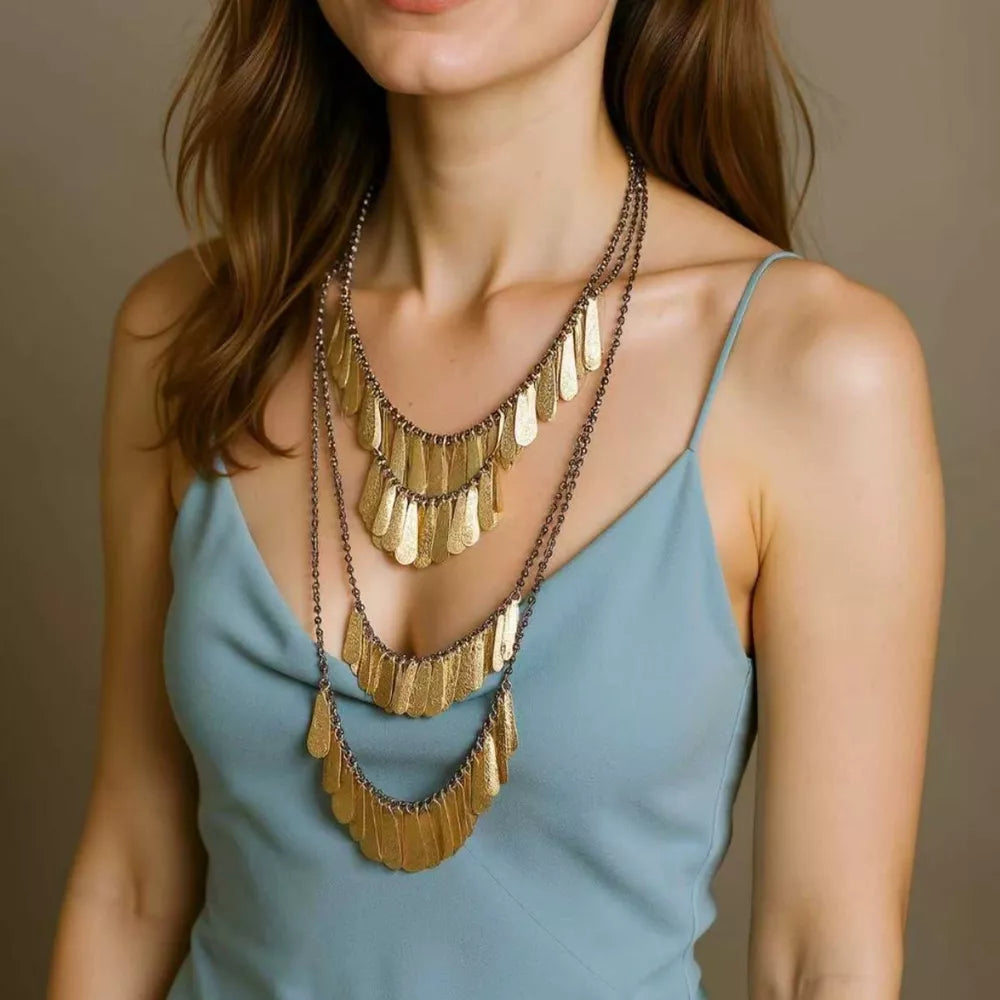 necklace in gold featuring layered and straight fit