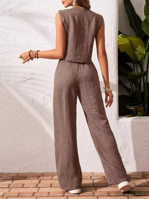 Cropped vest and wide-leg pants set in taupe textured fabric.