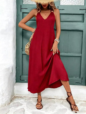 Red halter-detail midi dress with a-line cut and v-neckline.