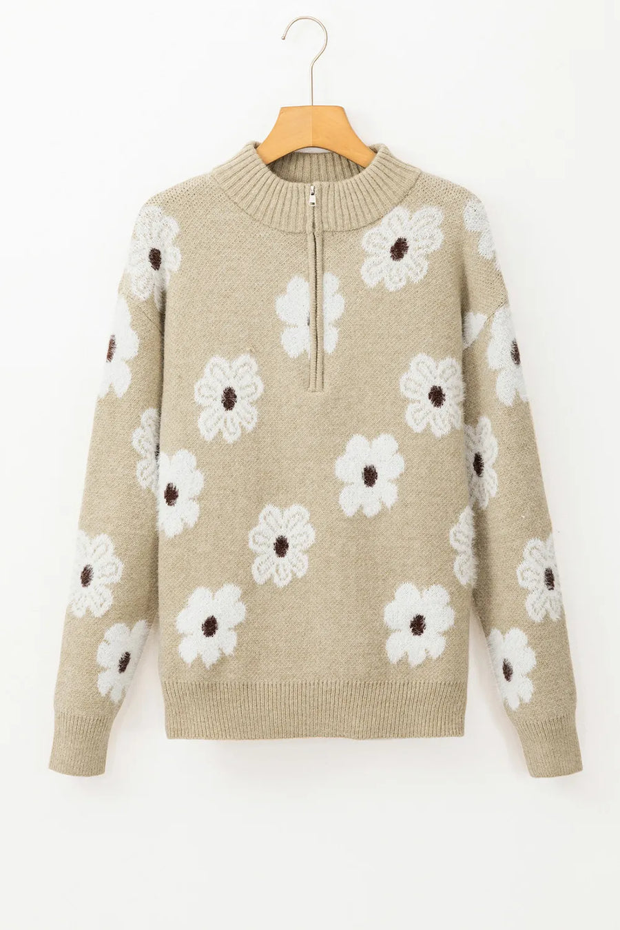 Tan acrylic mock neck sweater with white floral intarsia pattern and quarter zip.