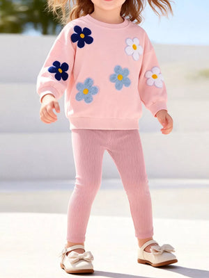 light pink sweatshirt with floral and crew neck