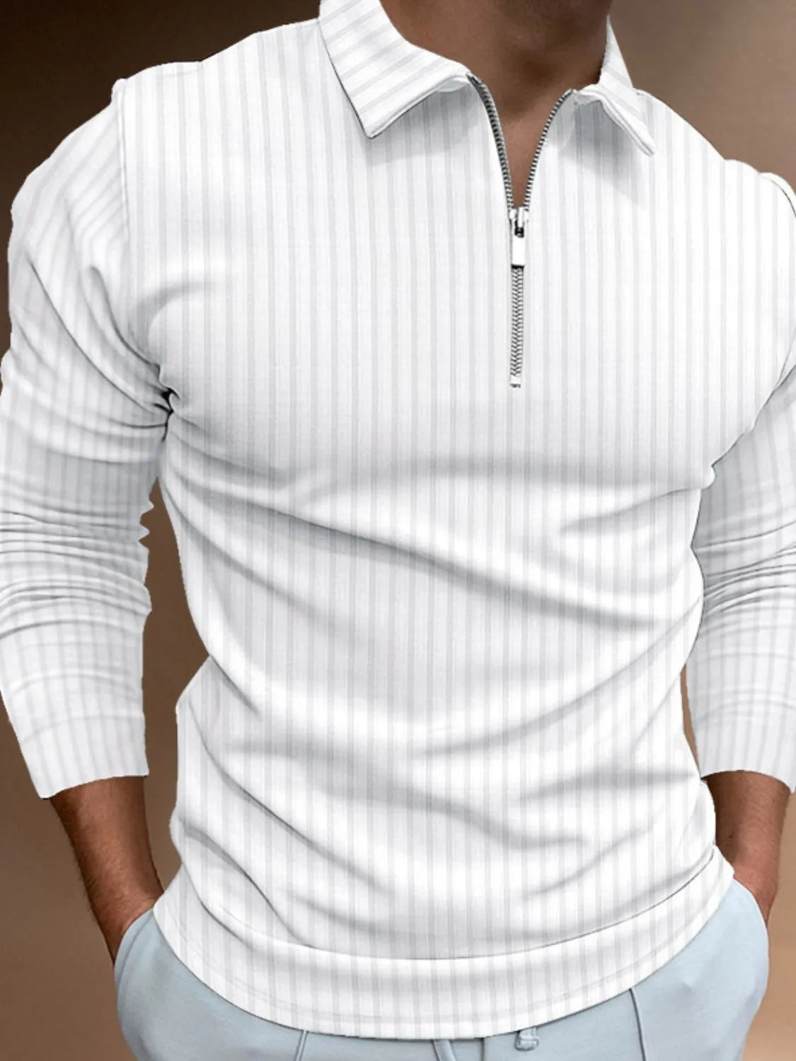White textured zip-neck polo with vertical stripes and long sleeves.