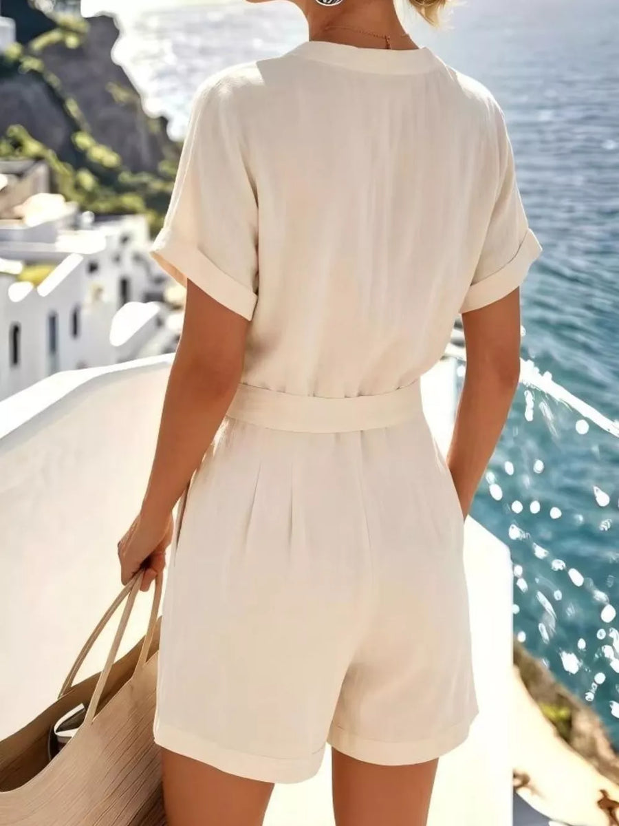 Apricot linen button-down shirt and cuffed shorts set with belted waist.