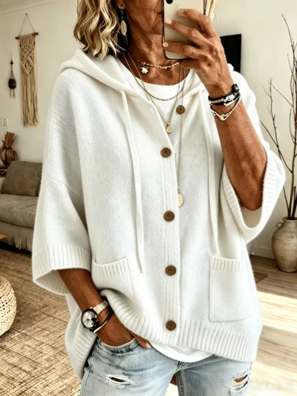 100% polyester Care instructions: Machine wash cold cardigan in Brown with relaxed silhouette