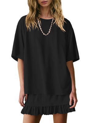 Black relaxed fit tee and ruffled skirt set with crew neck and short sleeves.