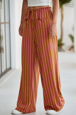 Wide leg pants with pink and brown stripes, drawstring waist, and pockets.