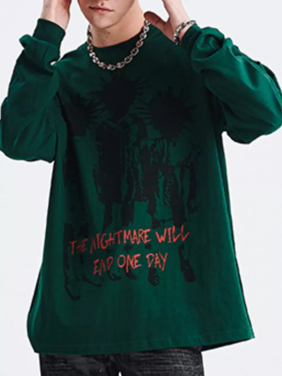 Men's oversized green cotton graphic long sleeve t-shirt with red text.
