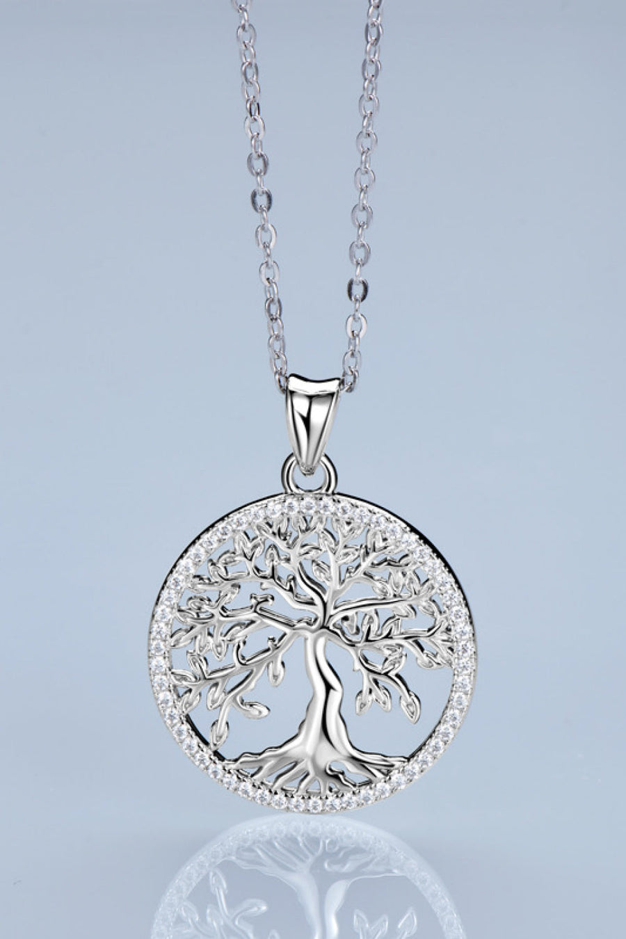 Sterling silver necklace with a circular Tree of Life pendant and crystal accents.