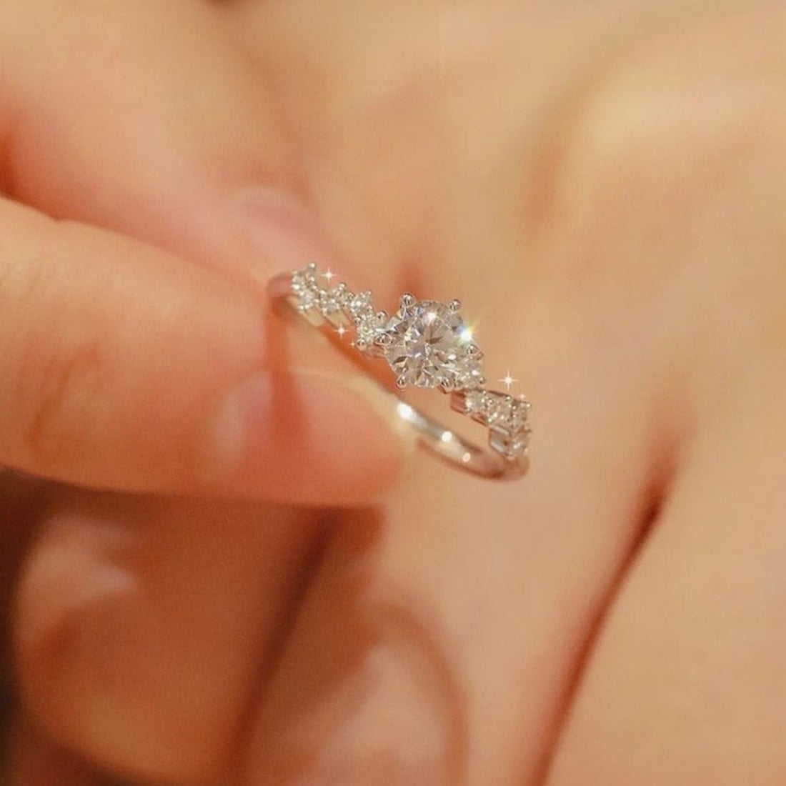 ring in silver featuring moissanite stones and straight fit