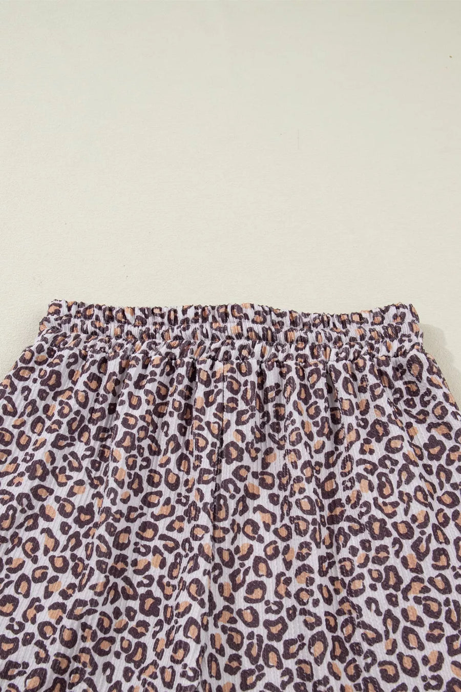 Leopard print ribbed loungewear set with drawstring waist detail.