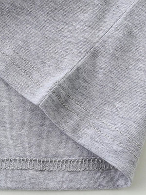 Toddler grey cotton t-shirt detail showing hem and seam stitching