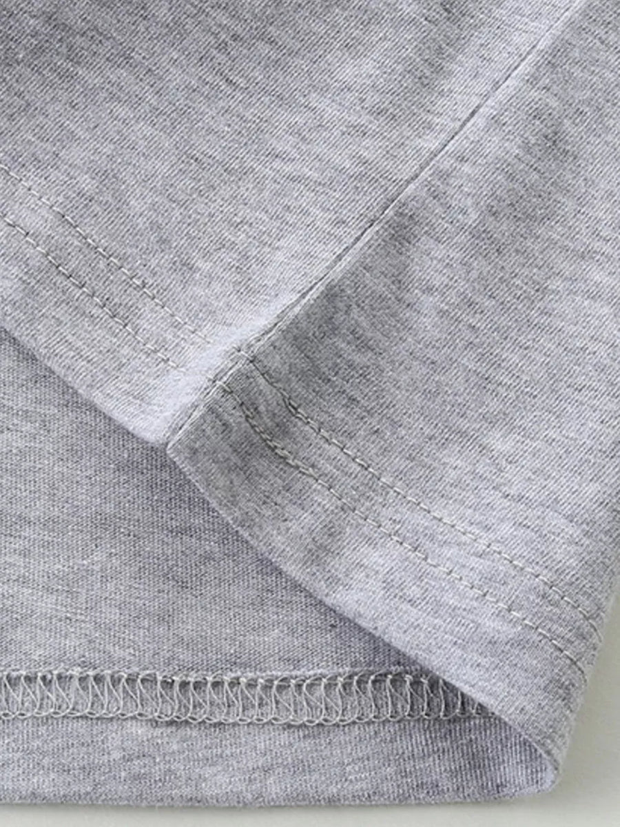 Toddler grey cotton t-shirt detail showing hem and seam stitching