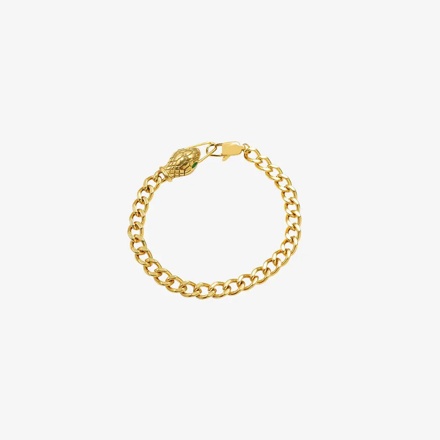 Gold serpentine chain bracelet with a green-eyed snake head clasp.