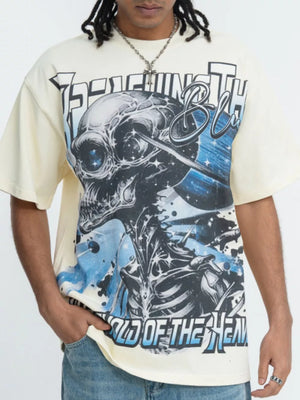 Beige graphic t-shirt with bold skull and text print, short sleeves, crew neck.