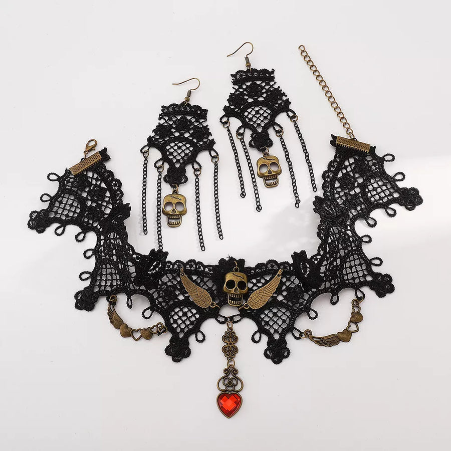necklace in antique gold with skull motif and 3-piece set