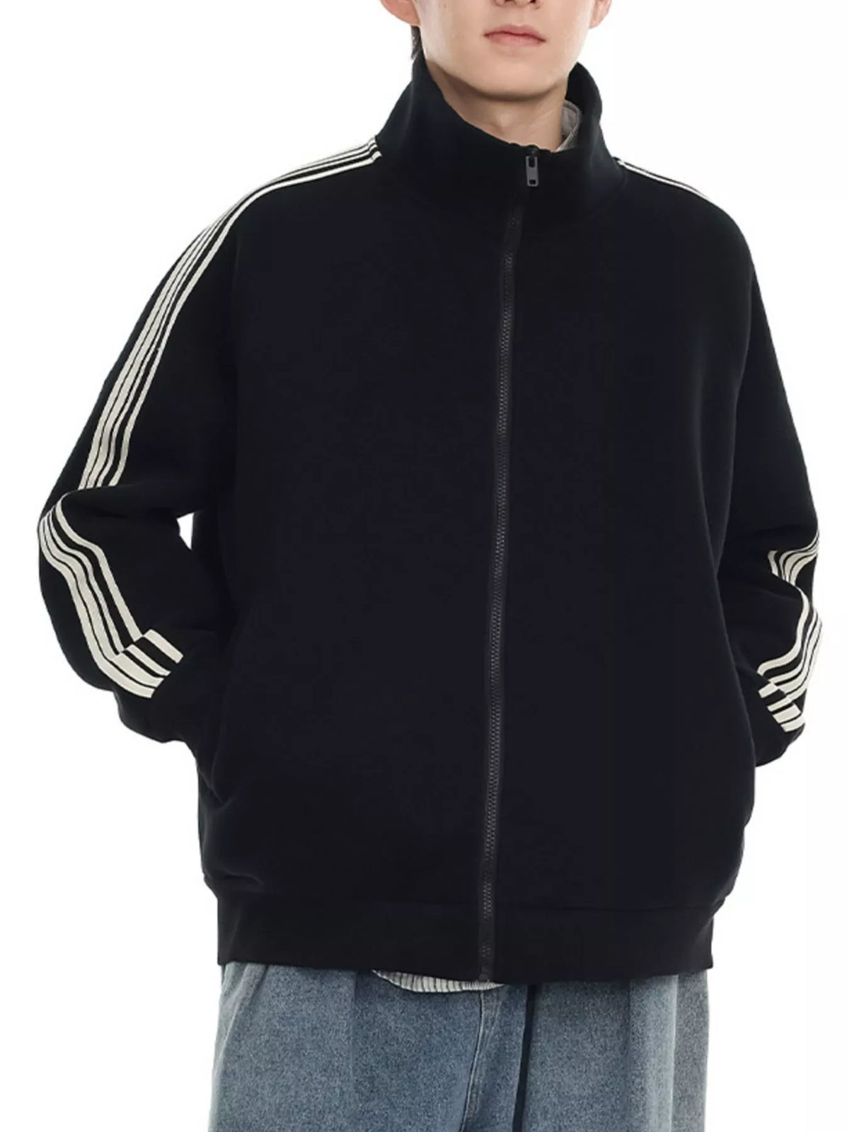 Black zip-up sweatshirt with contrast stripe details on sleeves and collar.