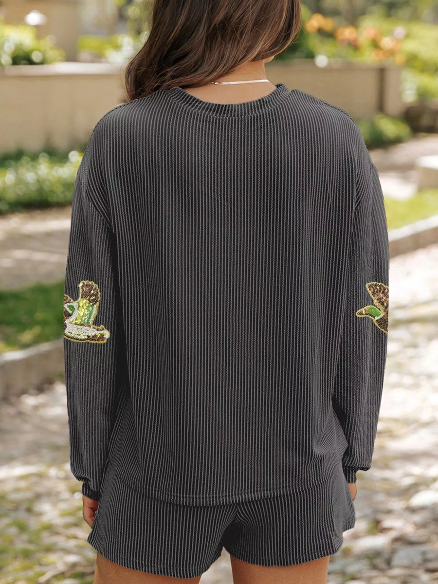 Dark gray ribbed lounge set with sequin patches on sleeves.