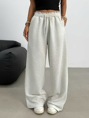 sweatpants in heather gray featuring drawstring and loose fit