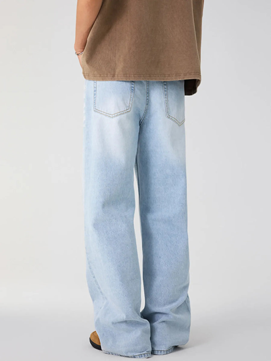 Washed wide-leg men's jeans in Glacier Blue denim with a relaxed fit.