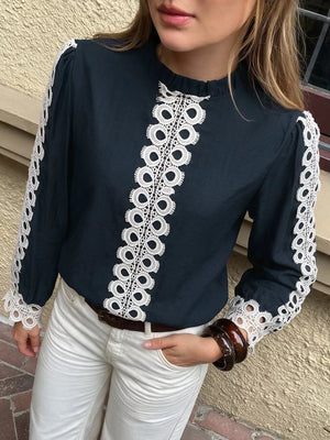 100% polyester Care instructions: Machine wash cold blouse in ivory with regular silhouette