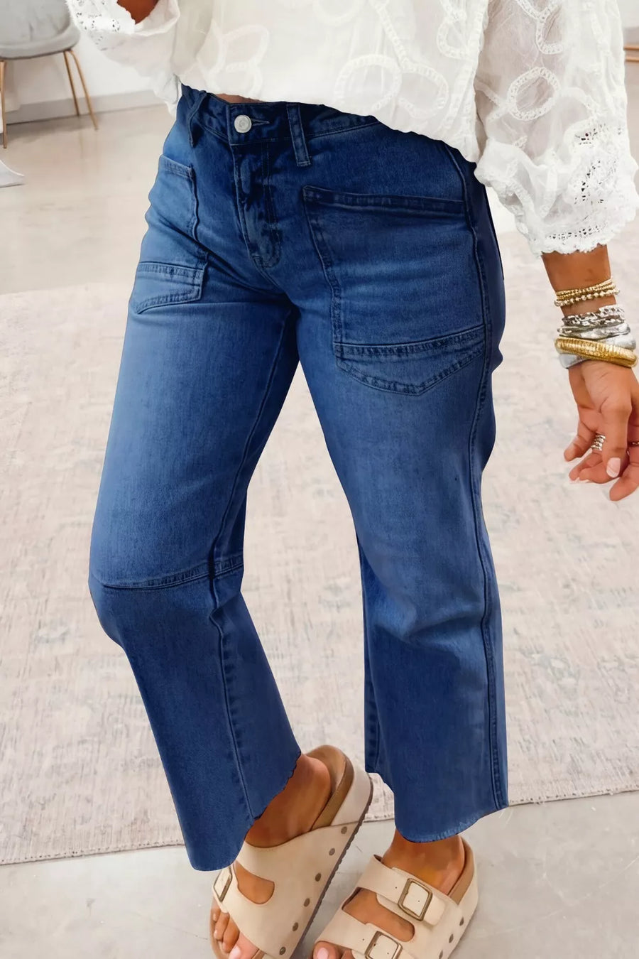 Maternity jeans in dark blue denim with a straight leg and utility pockets.
